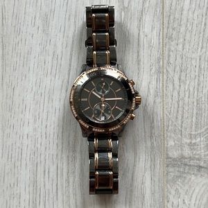 Michael Kors watch with rose gold crystal detailing and steel color